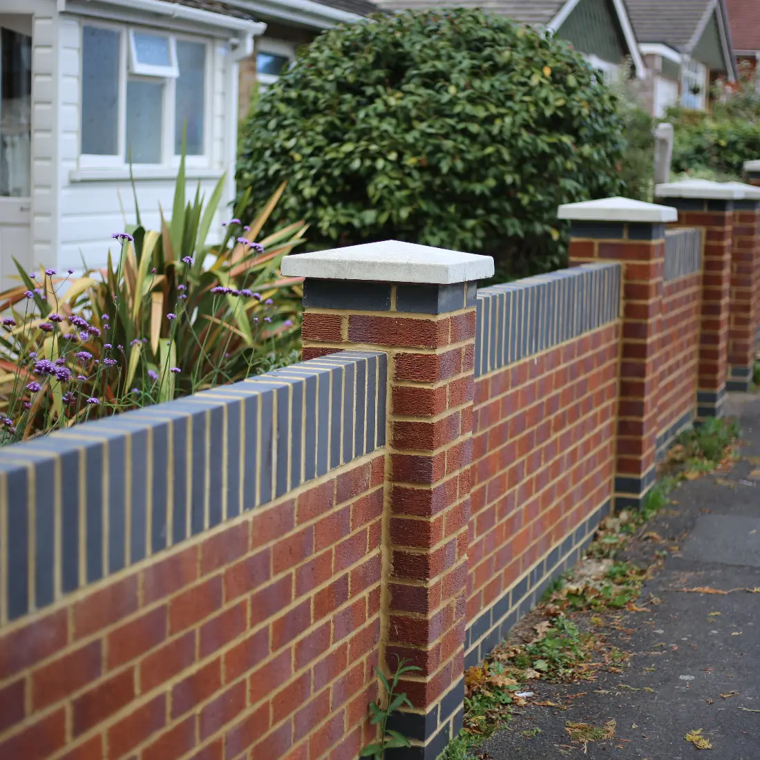 Brick wall with soldier course