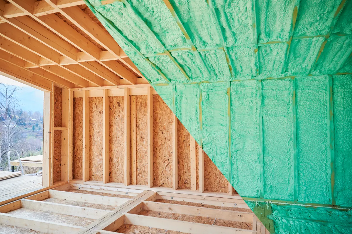 Spray foam sprayed across a loft roof slope and over the rafters